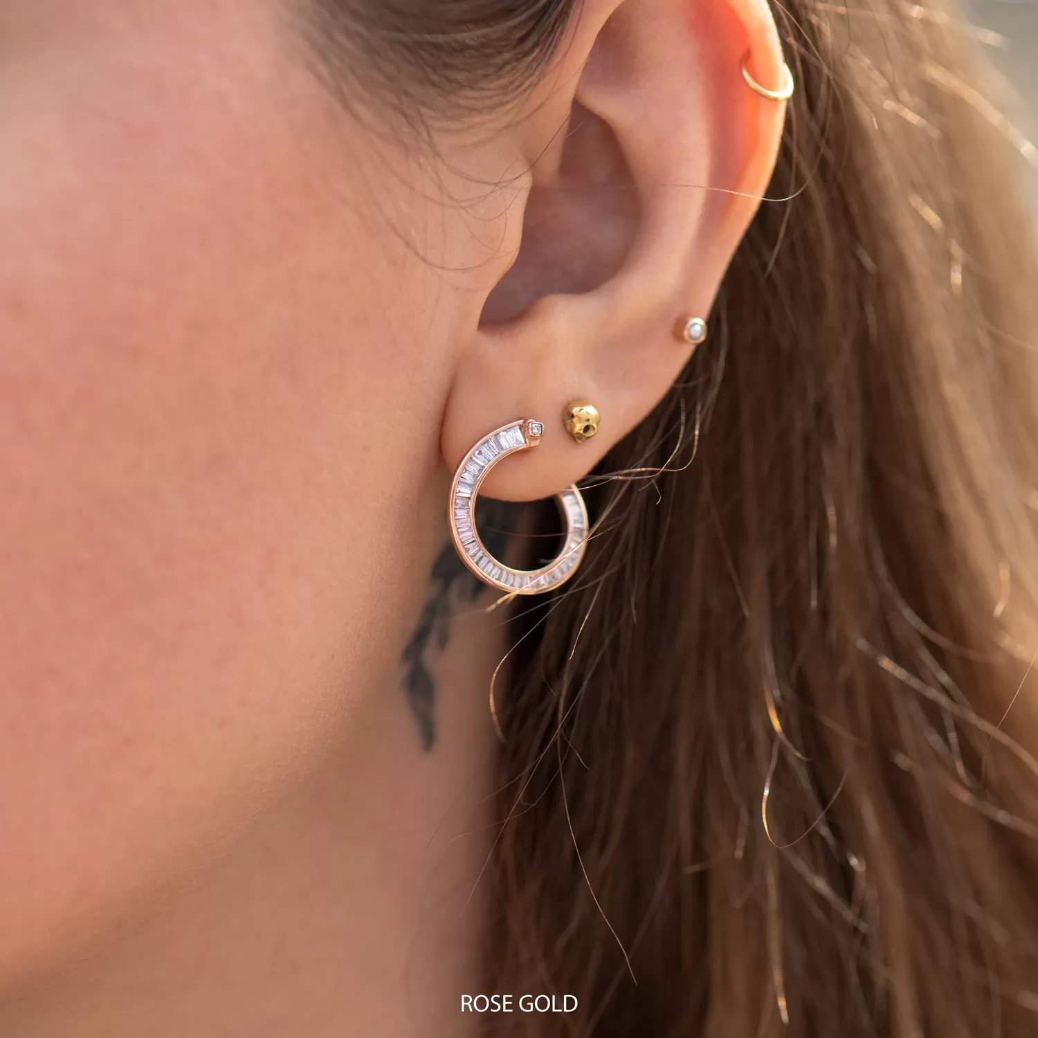 Spiral Hoop Earrings with Tapered Baguette Diamonds